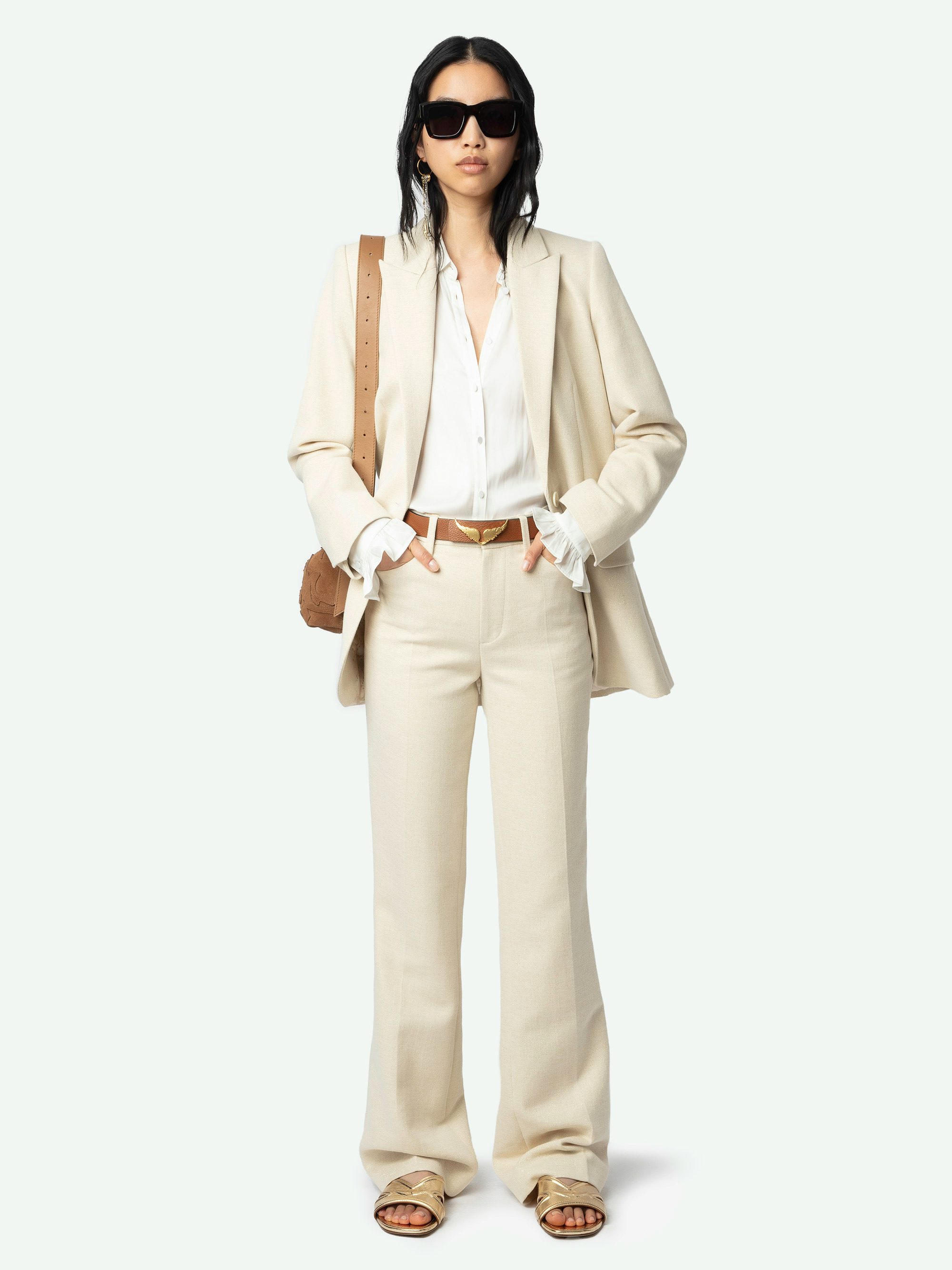 Azora Mules - A harmonious blend of edgy design and luxurious craftsmanship. These mules feature a metallic crinkled leather exterior, exuding a bold yet sophisticated allure. The embossed signature wings add a distinctive touch, embodying the brand's rebellious spirit. Designed with a square toe and crossover strap at the toe, they offer both style and comfort.